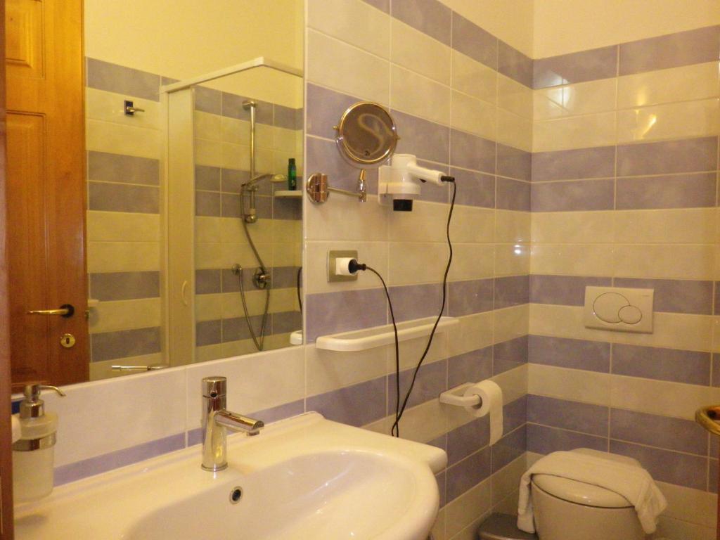 Elisart Guest House Alghero Quarto foto